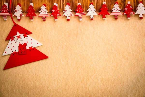 Adorno de Navidad sobre papel —  Fotos de Stock