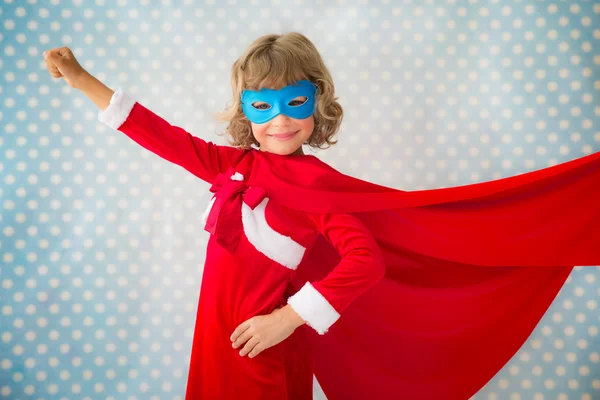 Superhero kid in Christmas — Stock Photo, Image