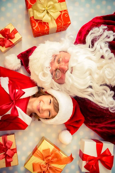 Santa claus en kind — Stockfoto