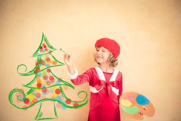 Barn målar juldekorationer — Stockfoto