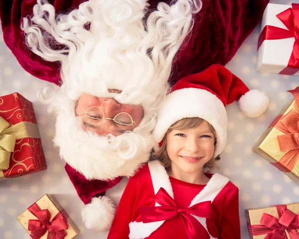 Santa Claus and child Stock Picture