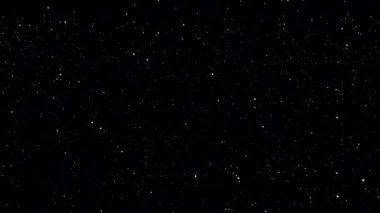 Uzayda siyah arkaplanda kar.