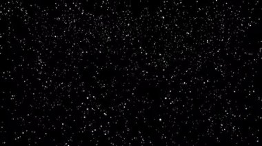 Uzayda siyah arkaplanda kar.