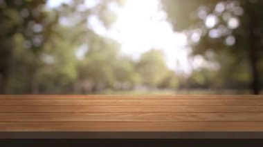 Table and Chair, Wood table bar and nature tree bokeh blurred background at morning time and beautiful nature sun light, Top wood table space area for products shows. 3840x2160. 4K UHD. Video Clip.