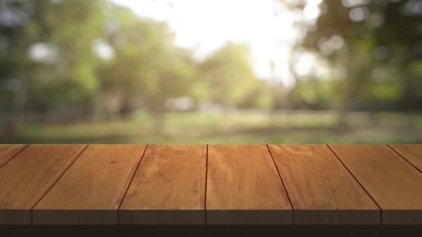 Top Bord Och Stol Träbord Bar Och Natur Träd Bokeh — Stockvideo