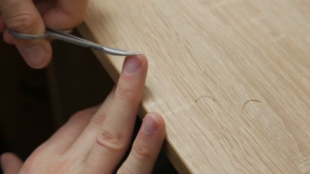 A Man Cuts Nails — Stock Video