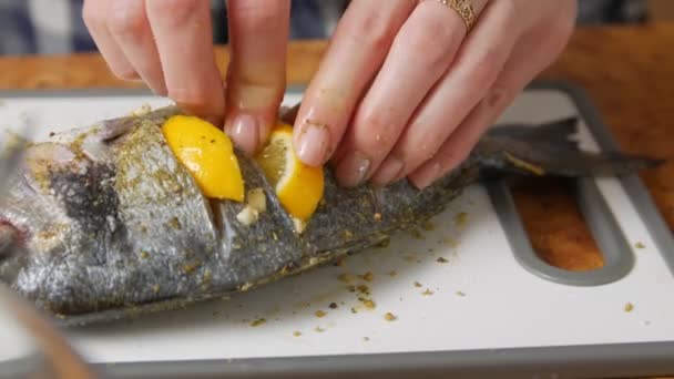 Fish With Seasoning And Lemon — Stock Video