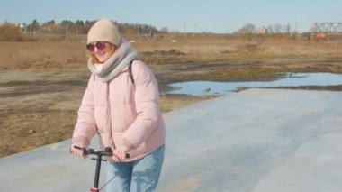 Woman Kick Scooter Outdoors