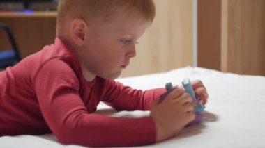 Boy With Toy Closeup