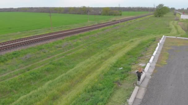 Woman Calling On Phone Outside The City — Stockvideo