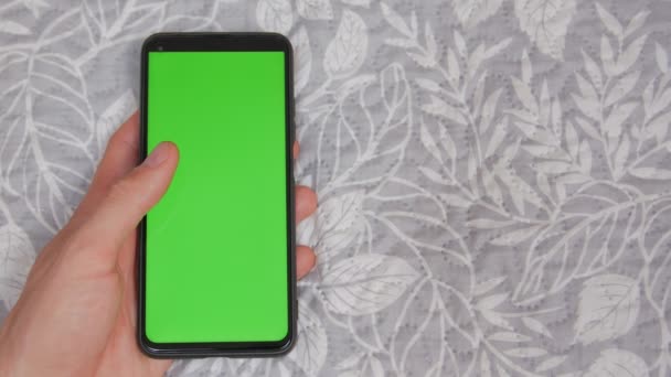 Smartphone mano izquierda pantalla verde — Vídeos de Stock