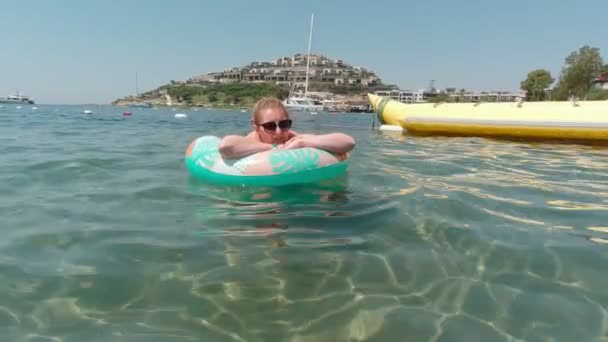 Woman With Inflatable Ring — Stock Video