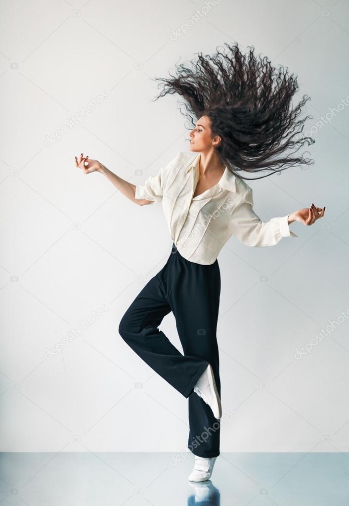 Happy jumping dancing girl