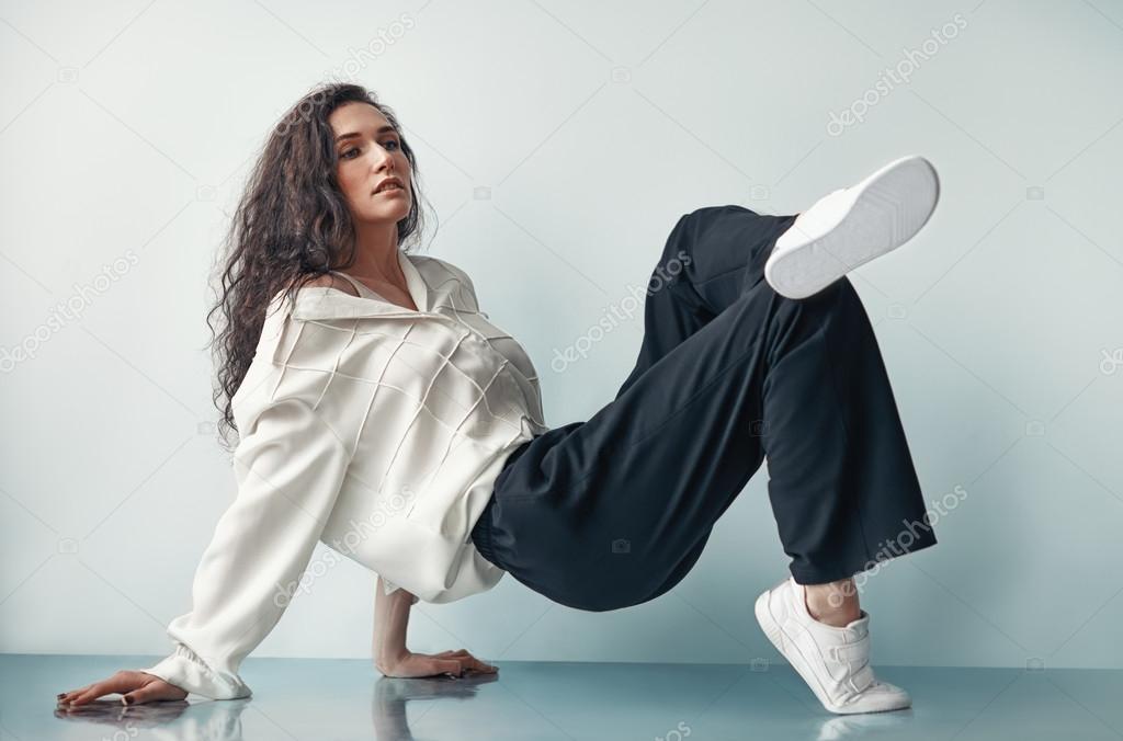 beautiful woman posing on the floor