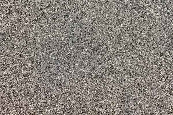 Текстура тёмного песка — стоковое фото