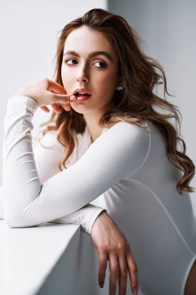 Close up portrait of sensual pretty young woman in white clothes — Stock Photo, Image