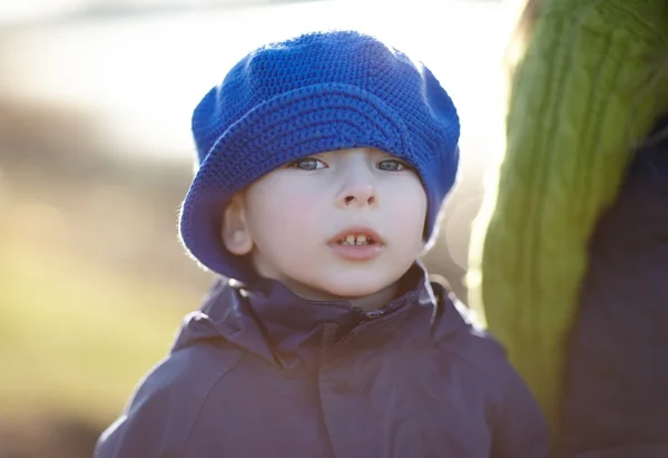 Little boy in blue hat — Stock Photo, Image