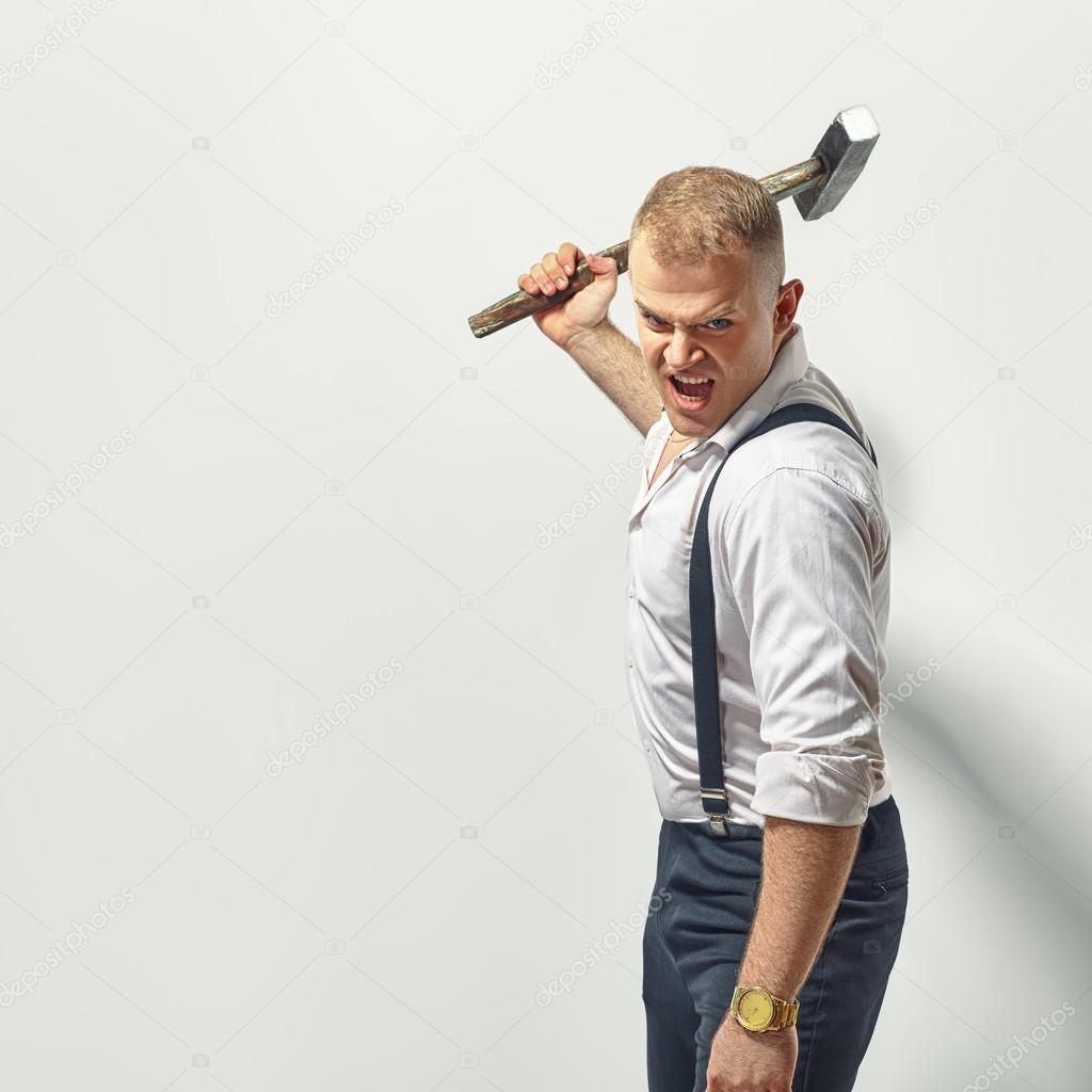 Angry man with hammer