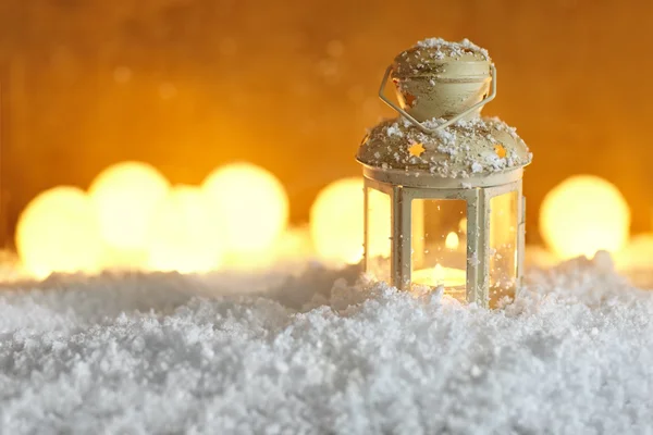 Christmas  Burning lantern in the snow. — Stock Photo, Image