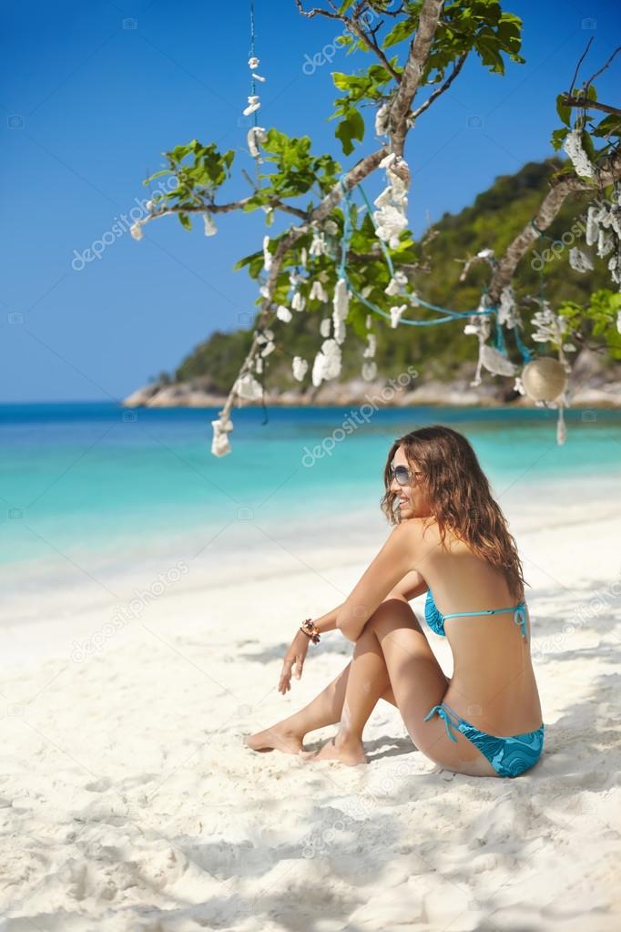 beautiful girl in bikini on beach