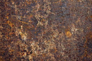 Eski paslı metal levha çeşitli desenler oluşturuyor