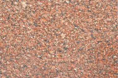 Sarı, kırmızı ve turuncu mermer. Doğal desenli taş döşeme. Mermer kaldırım, yakın plan..