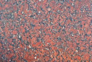 Sarı, kırmızı ve turuncu mermer. Doğal desenli taş döşeme. Mermer kaldırım, yakın plan..