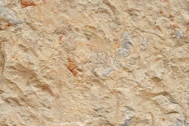 Sarı duvarda alçı var. Beton duvar dokusu kapat.