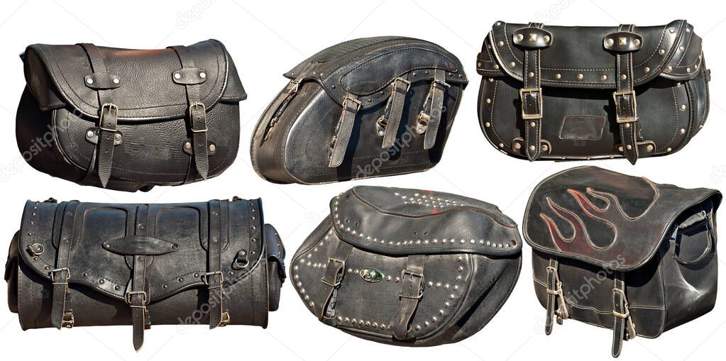 Black leather motorcycle bags. Biker gear isolated on former backgrounds. Handmade motorcycle bags.