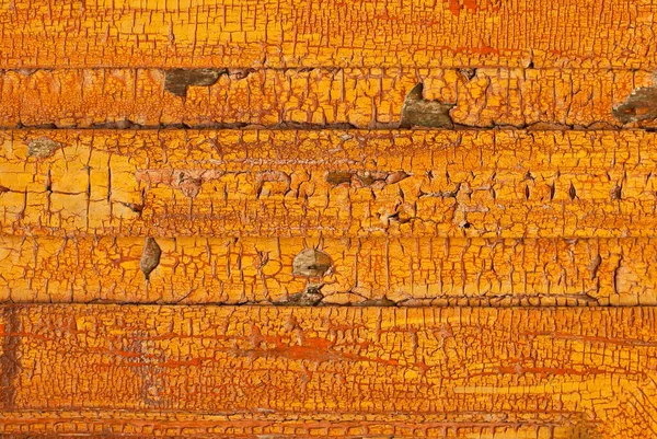 Old Orange Board Close Yellow Door Cracked Paint Texture Cracks — Stock Photo, Image