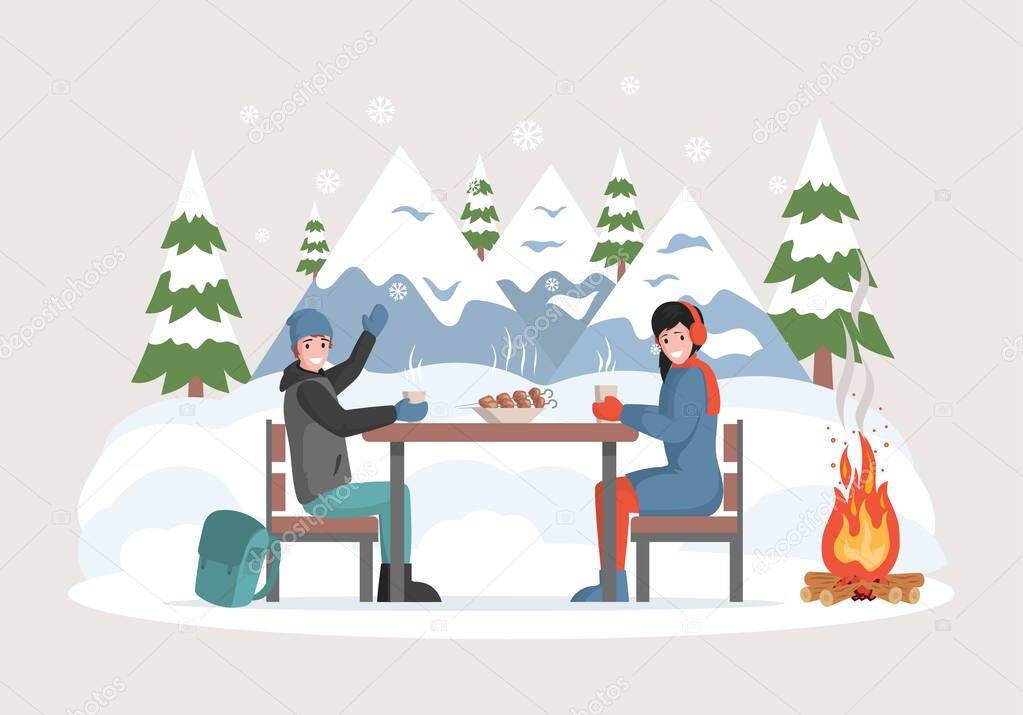 Happy winter holidays vector flat concept. Smiling man and woman in warm clothes sitting outdoor near campfire.