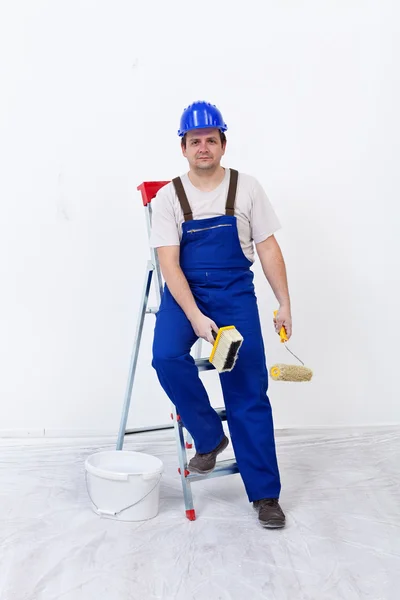 Worker with painting utensils — Stock Photo, Image