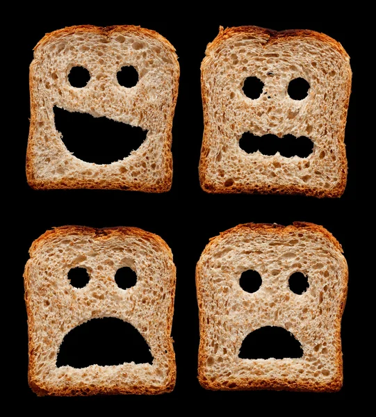 Rostos felizes, preocupados, chocados e assustados feitos de fatias de pão — Fotografia de Stock