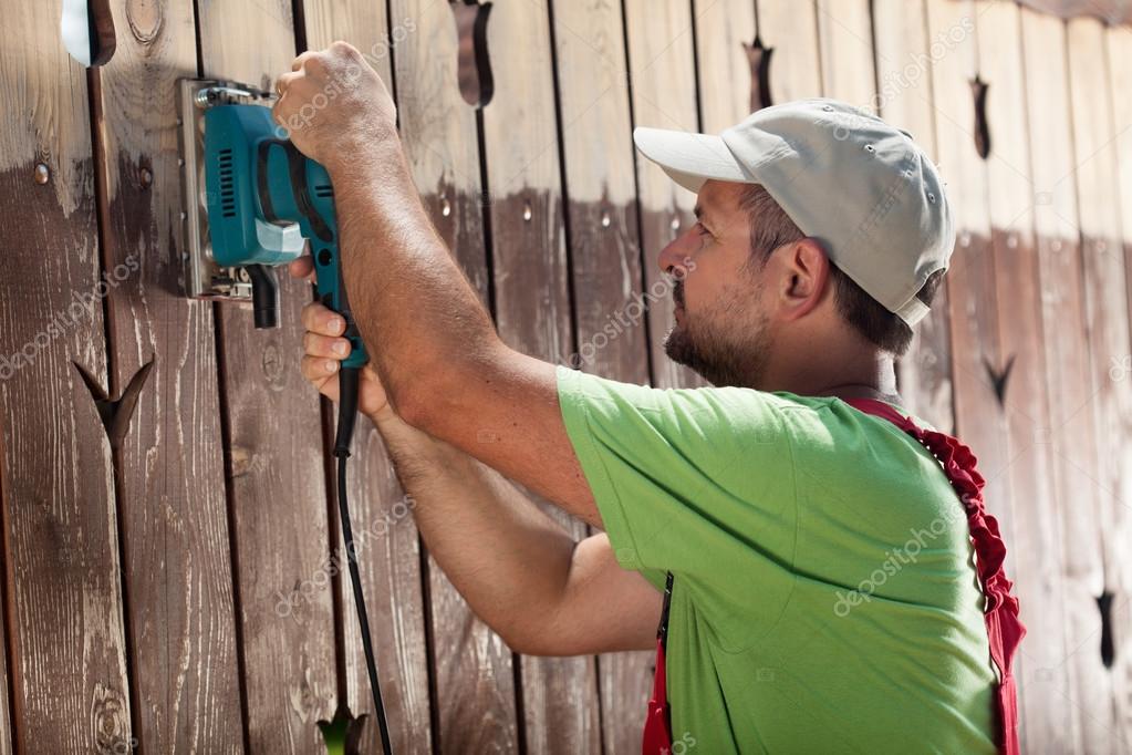 Worker with vibrating sander Stock Photo by ©lightkeeper 123705464
