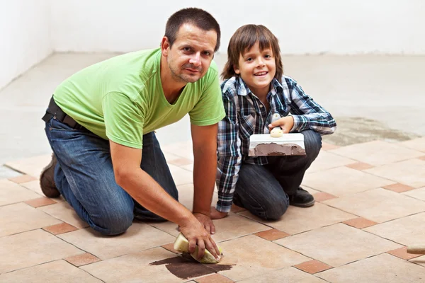 Testing the color of joint on ceramic floor tiling — Stock Photo, Image