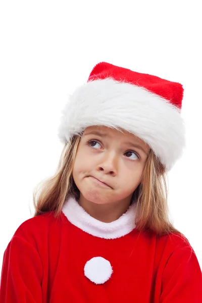 圣诞老人服装的小女孩 免版税图库照片