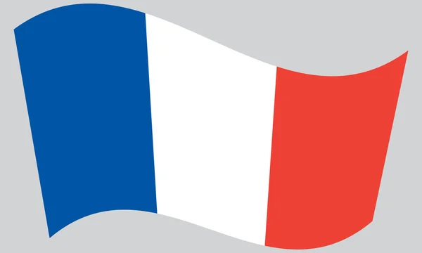 Bandera de Francia ondeando — Vector de stock