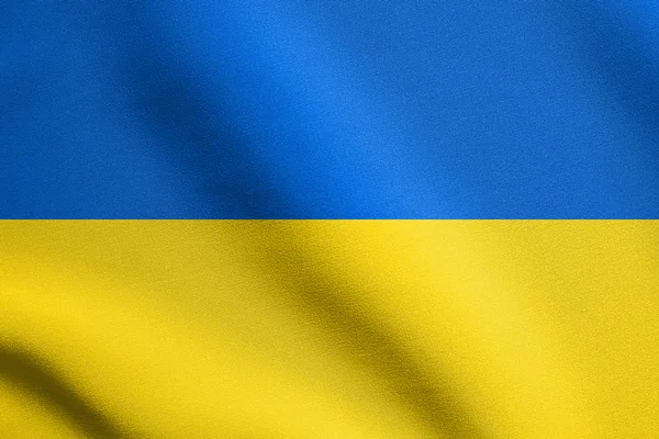 Bandeira da Ucrânia acenando no vento com textura de tecido — Fotografia de Stock
