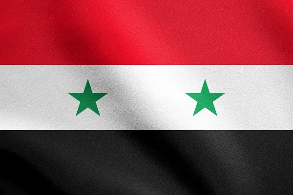 Bandiera della Siria sventola nel vento con trama in tessuto — Foto Stock