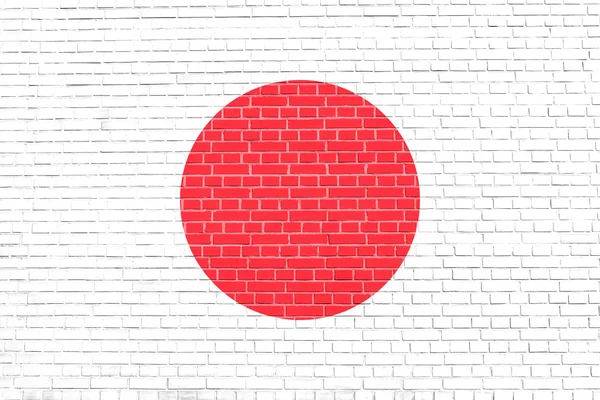 Flagge von Japan auf Backsteinwand Textur Hintergrund — Stockfoto