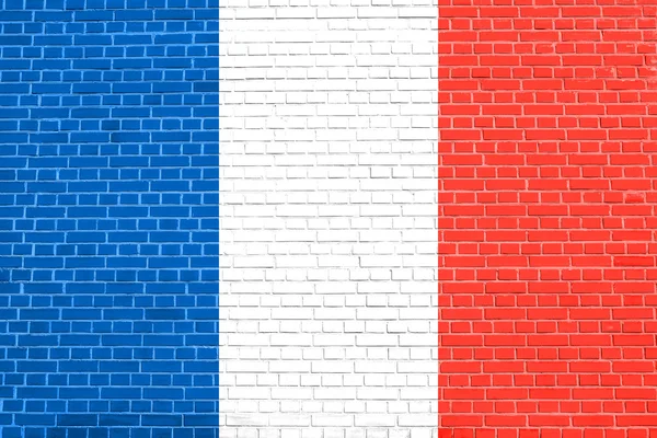 Flagge von Frankreich auf Backsteinwand Textur Hintergrund — Stockfoto