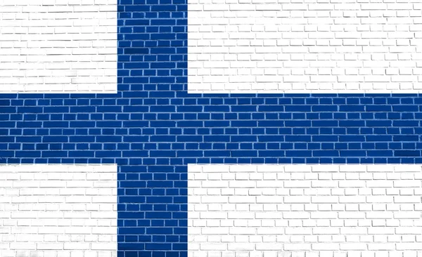 Bandera de Finlandia sobre muro de ladrillo textura fondo —  Fotos de Stock