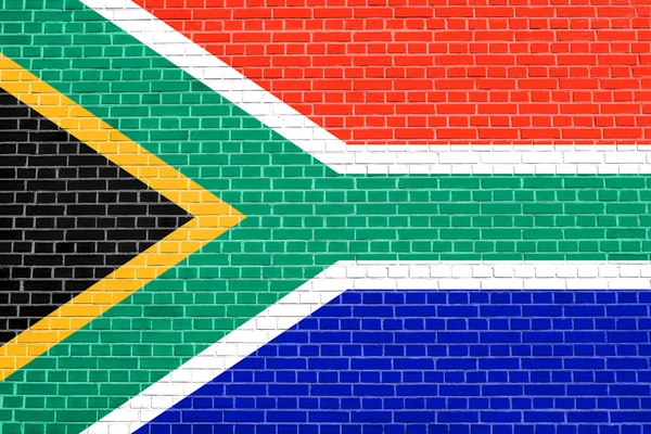 Drapeau de l'Afrique du Sud sur fond de texture de mur de briques — Photo
