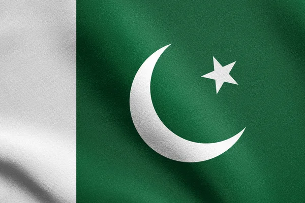 Flagga Pakistan viftande med tyg konsistens — Stockfoto