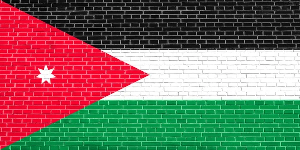 Flagge von Jordanien auf Backsteinwand Textur Hintergrund — Stockfoto