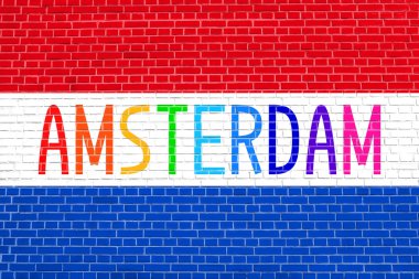 Hollanda bayrağı ve word Amsterdam tuğla duvar