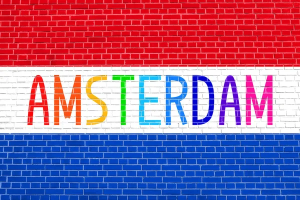 Hollanda bayrağı ve word Amsterdam tuğla duvar