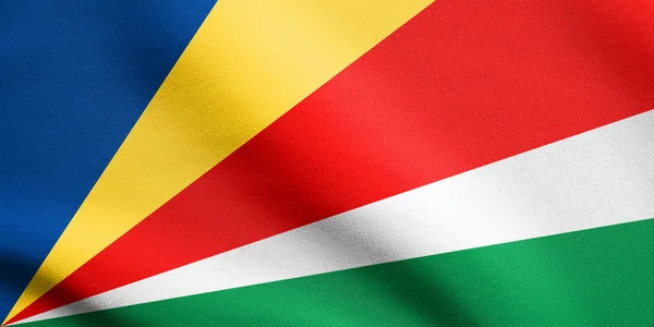 Seychelská vlajka mávající strukturou textilií — Stock fotografie