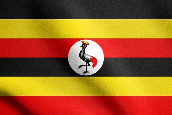 Flag of Uganda waving with fabric texture — Stock Photo, Image