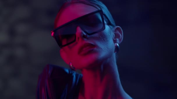 Beauty Fashion Model Girl Wearing Stylish Sunglasses On Light Blue Background. — Stock Video